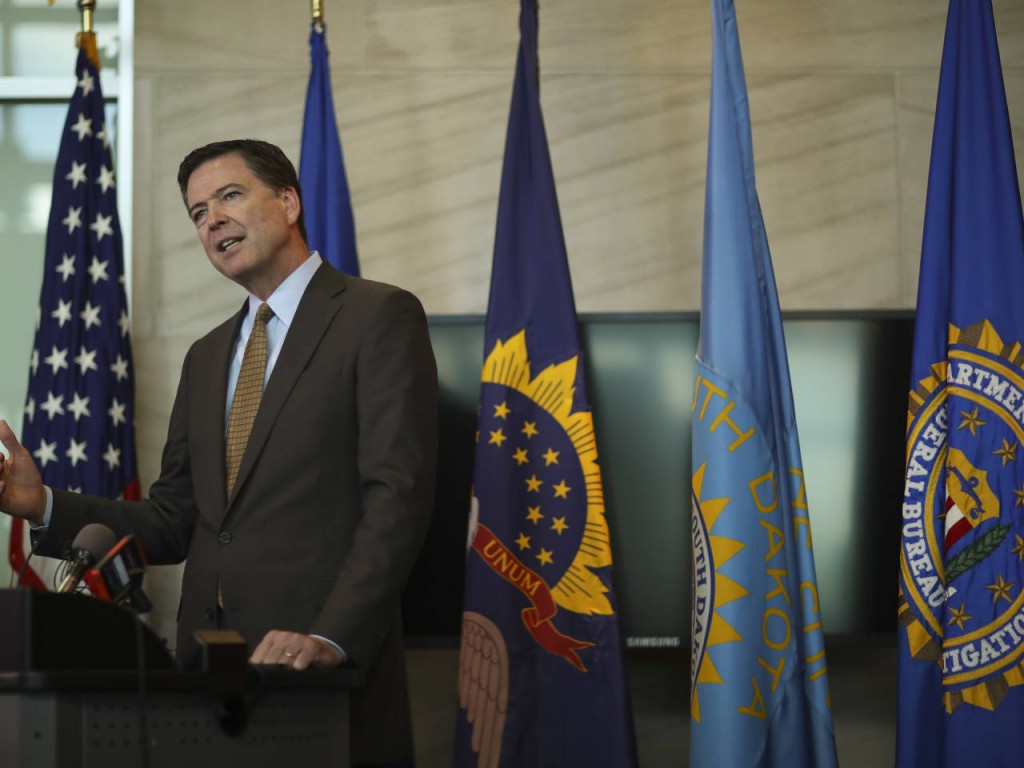 FBI Director James Comey speaks during a news conference Tuesday afternoon June 7, 2016, in Minneapolis, Minn., while in town as part of a two-day regional visit. (Jeff Wheeler/Star Tribune via AP) MANDATORY CREDIT; ST. PAUL PIONEER PRESS OUT; MAGS OUT; TWIN CITIES LOCAL TELEVISION OUT