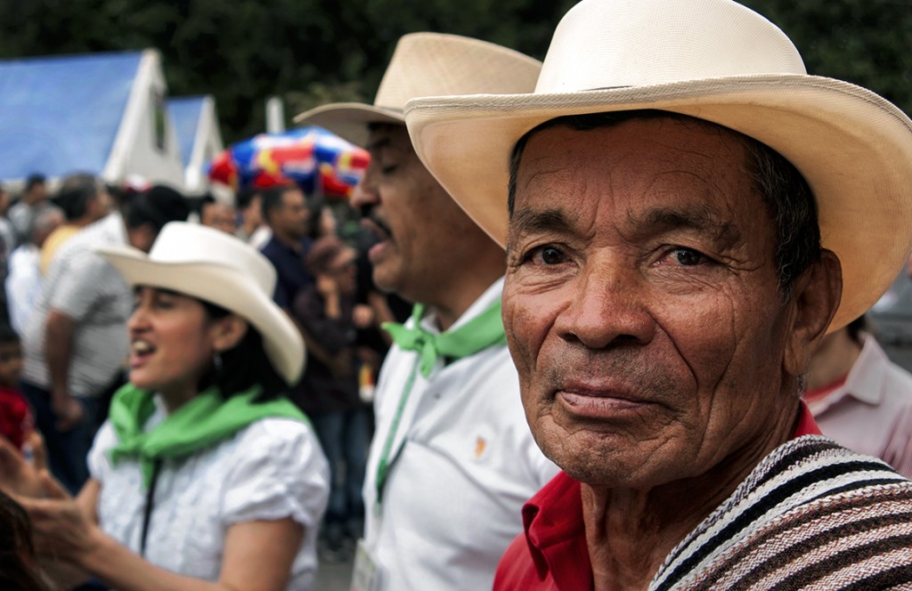 A farmer wanders through Libano, Colombia's main plaza during the Dia del Campesino (Day of the Farmer) celebration.